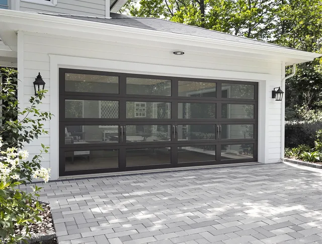 Powell Garage Door Repair design specialist presenting custom garage door options to Powell homeowner