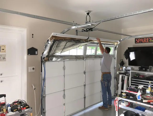 Garage door section replacement by Powell Garage Door Repair in Powell