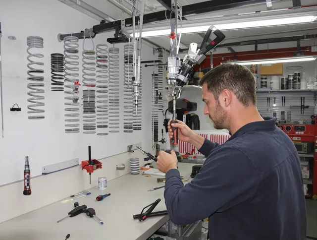 Powell Garage Door Repair safety certified technician performing precision spring replacement in Powell