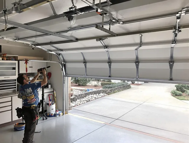 Garage door track repair service by Powell Garage Door Repair in Powell